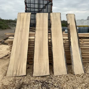an image of live edge maple slabs